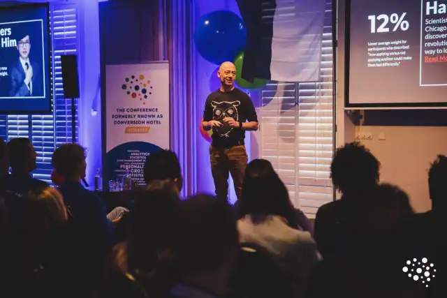 Lukas on stage presenting at Conversion Hotel in the Netherlands, 2019.