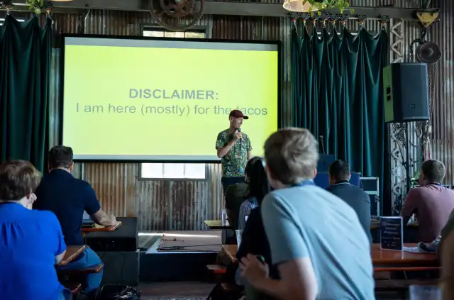 Lukas on stage presenting at CXL in Austin, 2024.