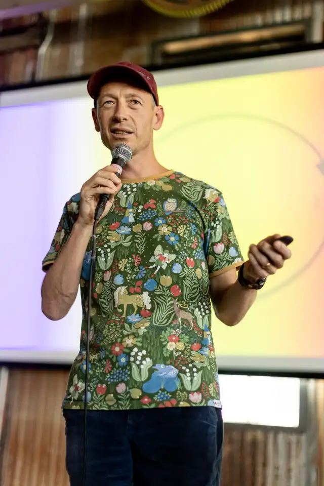 Lukas on stage presenting at CXL in Austin, 2024.